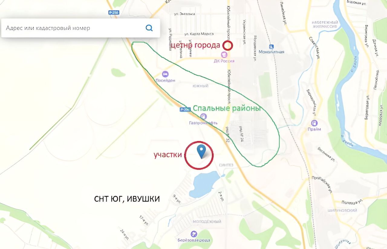 На изображении представлен участок земли, обозначенный на карте. Участок расположен в районе с обозначением "СНТ ЮГ, Ивушки". На карте видны основные дороги и соседние районы, включая "Спальные районы" и "Центр города". Участок выделен синим маркером, что указывает на его местоположение. Окружающая территория изображена в виде линий и контуров, что помогает понять планировку местности. Цветовая палитра карты включает светлые и зеленые оттенки, что создает четкое представление о границах и расположении участка.